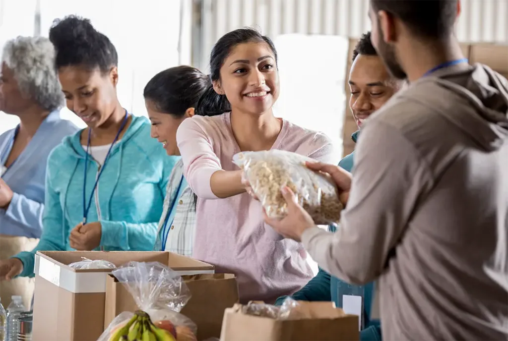 people work packing food to give to the hungry