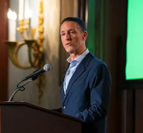 Founder, Alan Ranzer, presenting at a conference.